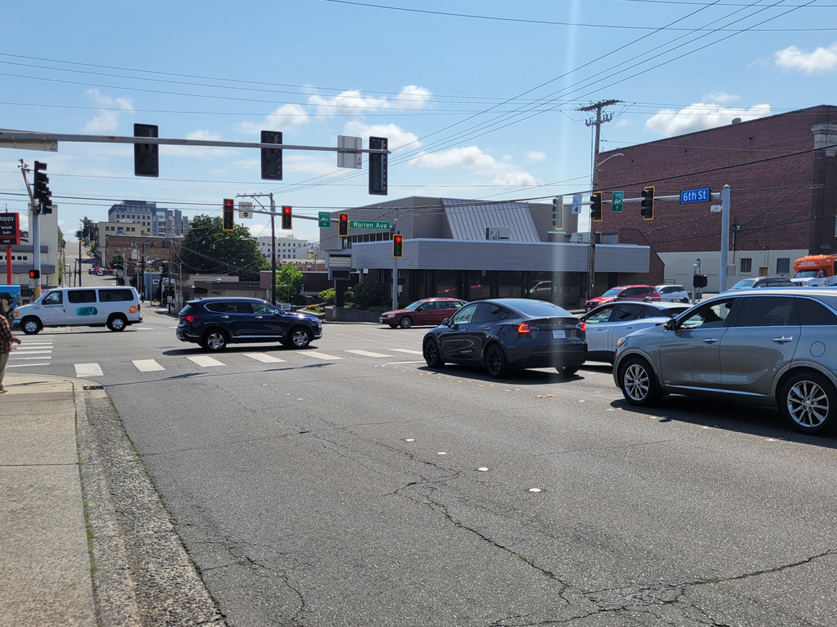 Image of an intersection along the 6th Street corridor with pedestrian crossings.